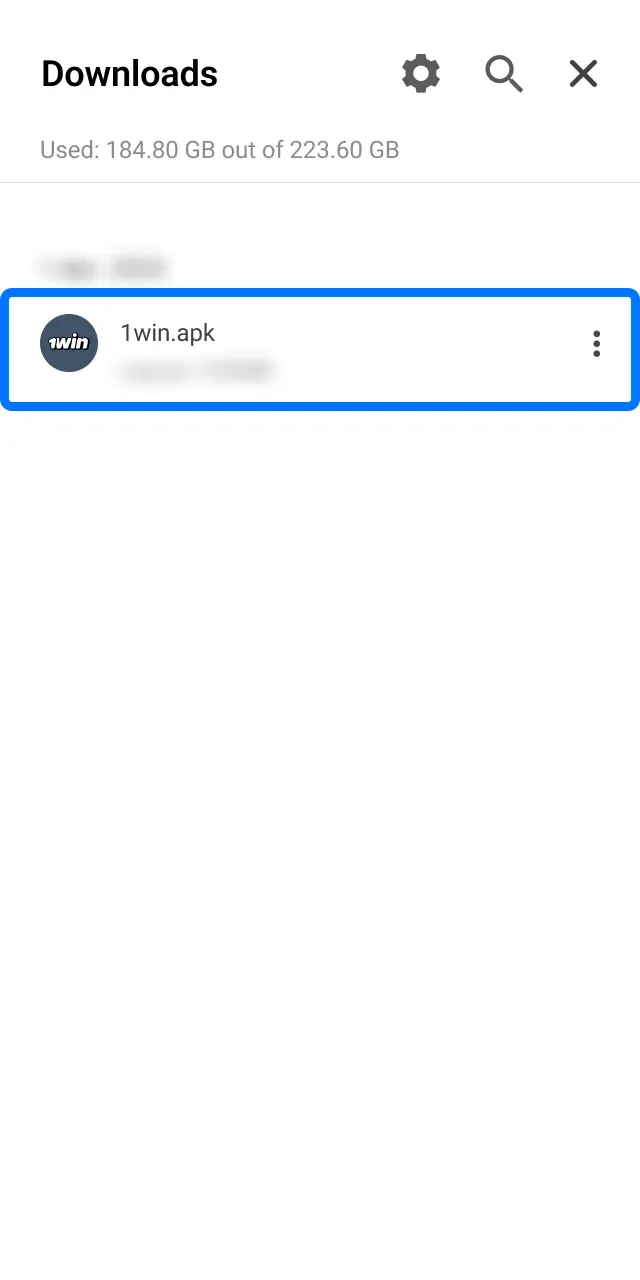Open your browser menu and go to Downloads to locate the 1win APK file.